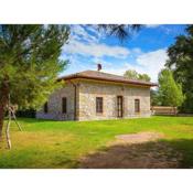 A rustic house set in the Tuscan landscape