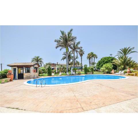 Nice home in Ispica with Outdoor swimming pool, WiFi and 3 Bedrooms